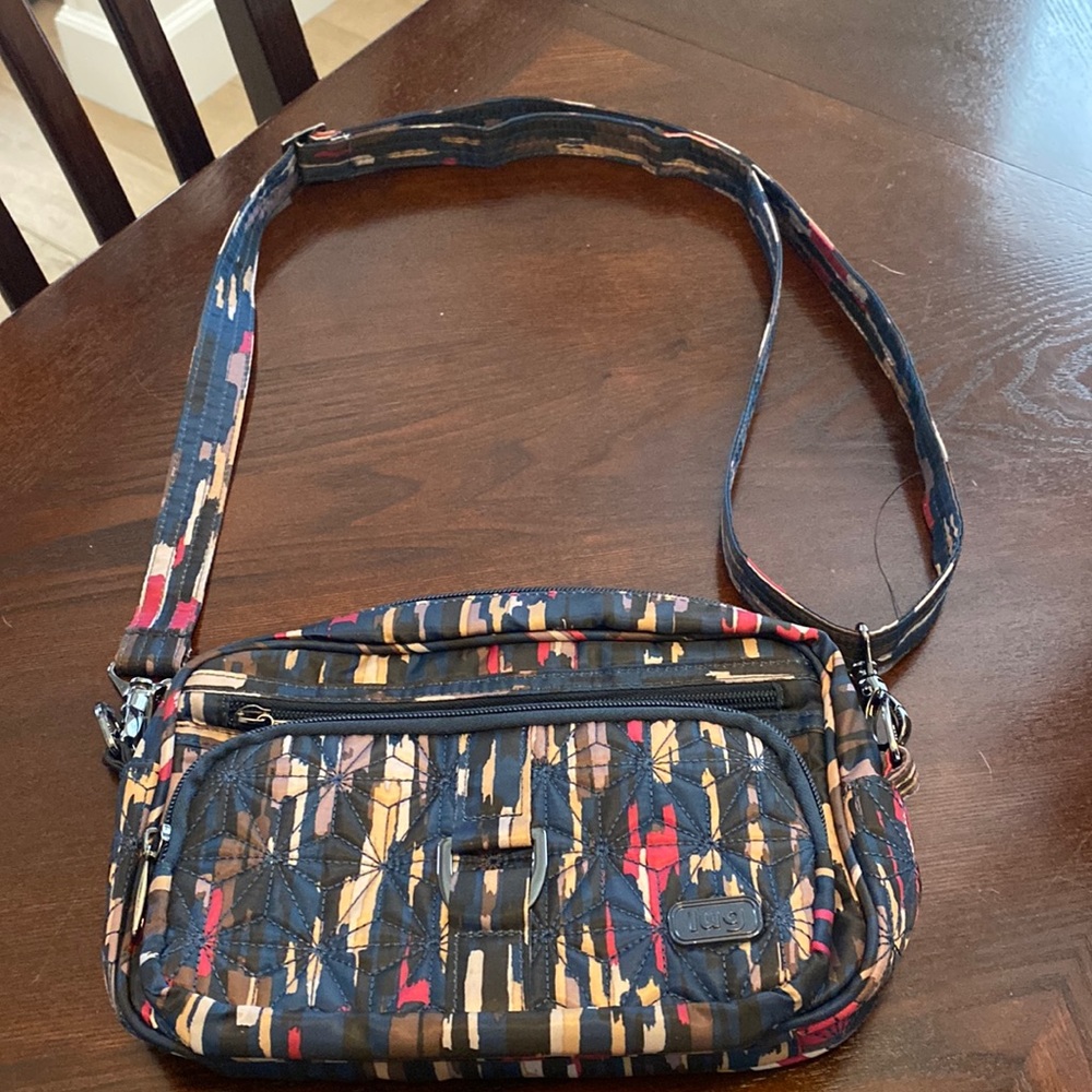 Lug multi color over the shoulder or cross bag. Used very little.